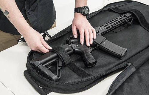 UTG - Waffenkoffer Leapers Alpha Battle Carrier Sling Pack - 34" - Schwarz - PVC-PSP34B